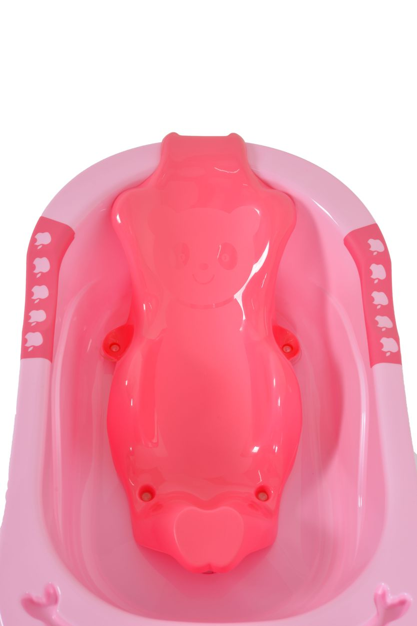 Eine rosa Babybadewanne mit einem Bären-förmigen Einsatz.