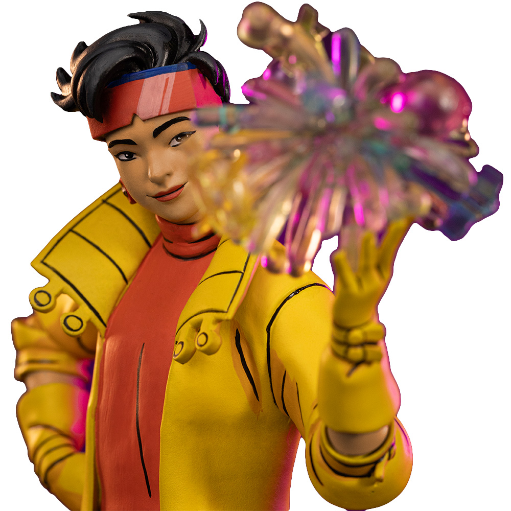 Eine Figur mit gelber Jacke, rotem Kragen und einem glitzernden Objekt in der rechten Hand.