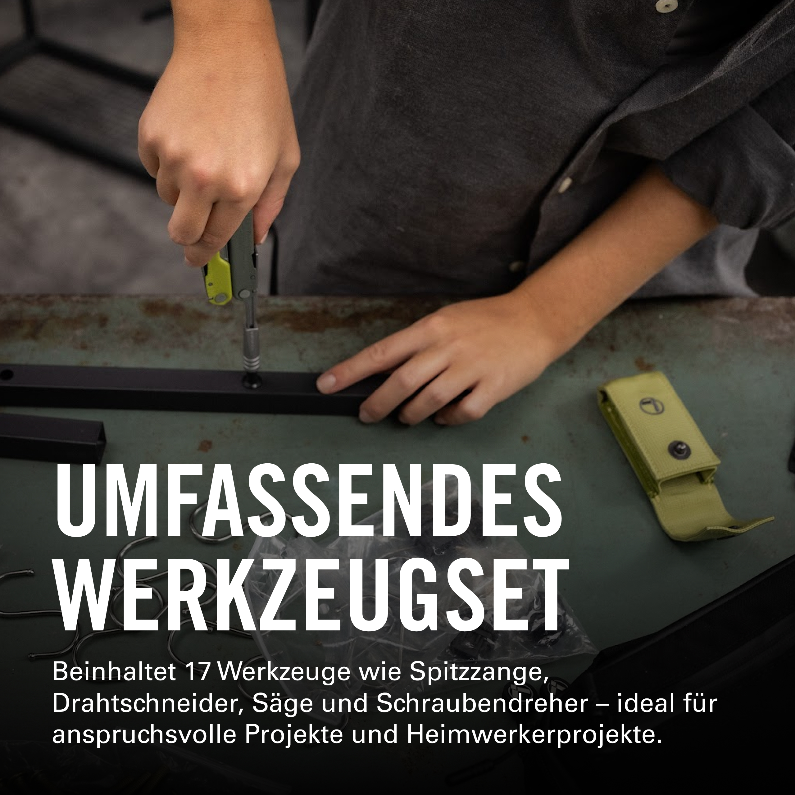 Person benutzt Werkzeug an einem Tisch. Werkzeugset mit Zange, Säge, Schraubendreher.