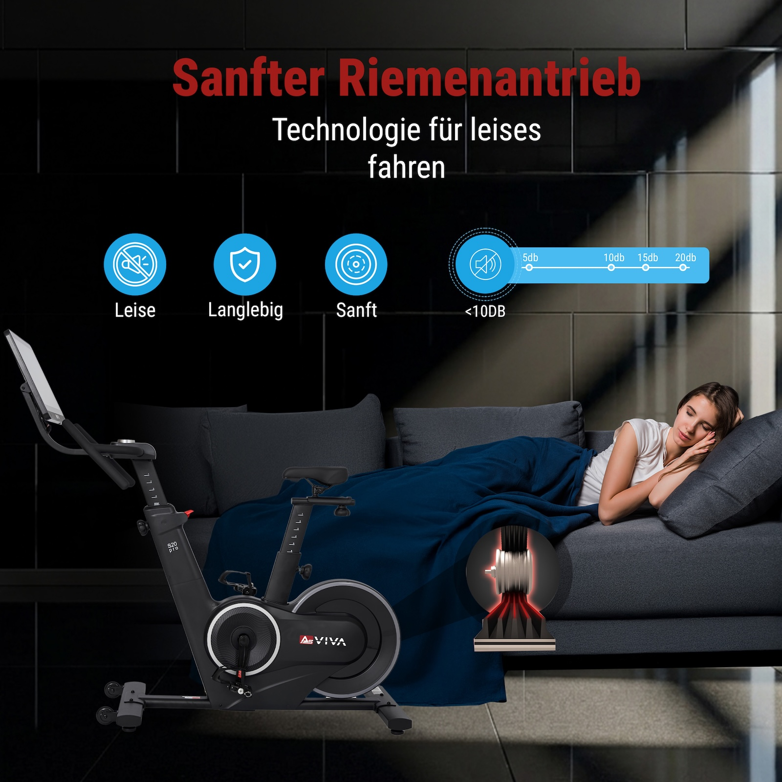 Ein Heimtrainer mit Riemenantrieb steht neben einem Sofa, auf dem eine Frau schläft.