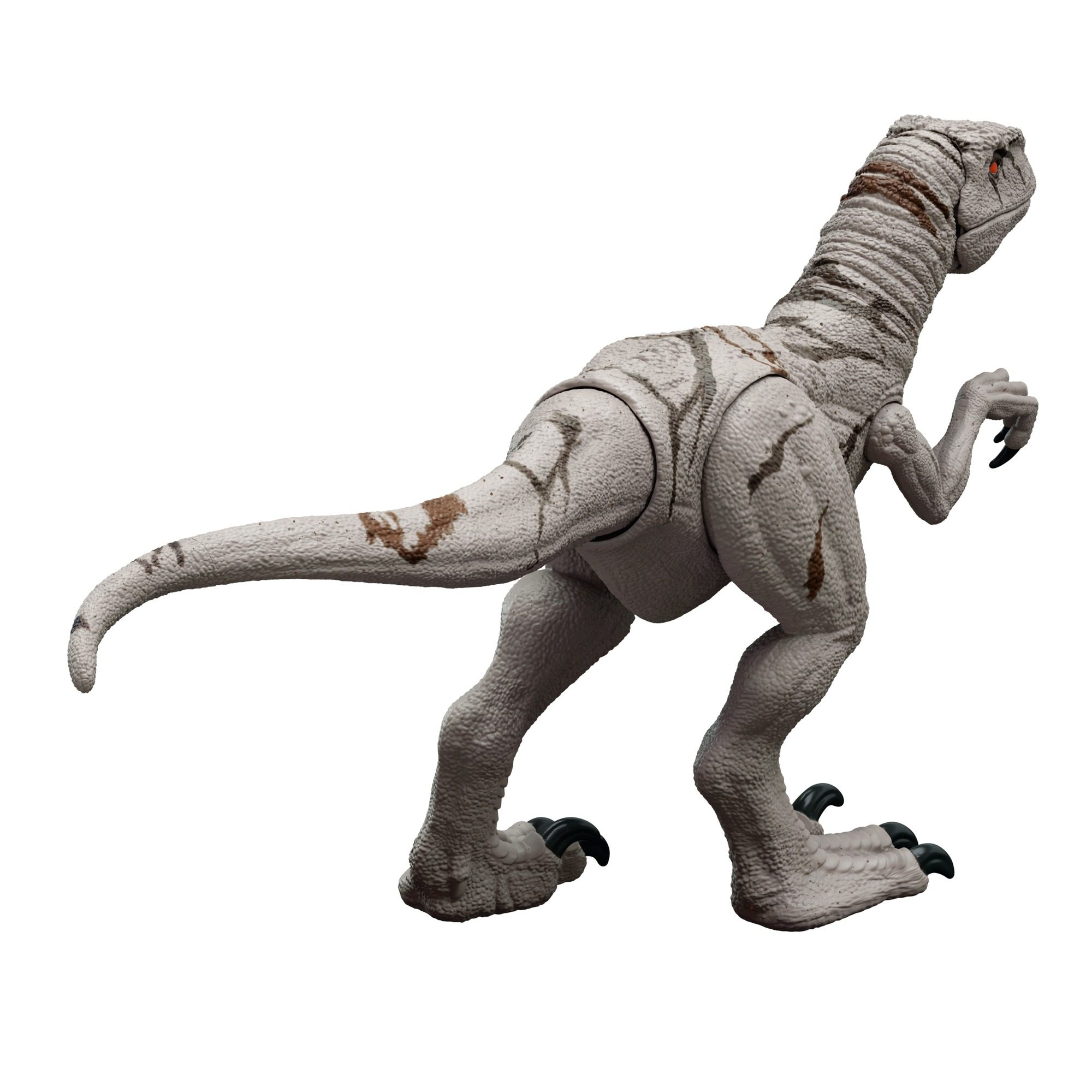 Un giocattolo dinosauro grigio con strisce marroni e occhi rossi.