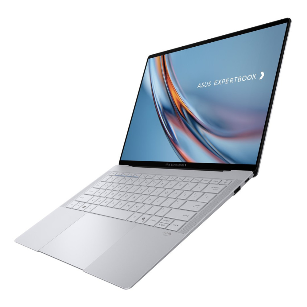 Srebrny laptop Asus ExpertBook jest otwarty, z podświetlaną klawiaturą.