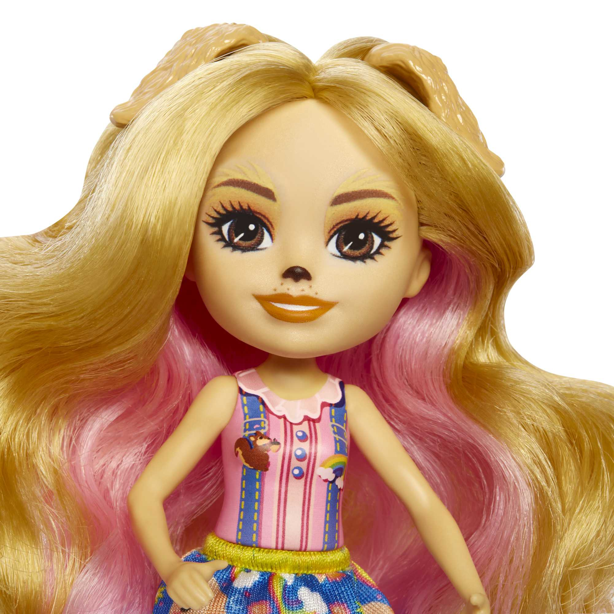 Eine Puppe mit blonden Haaren und rosa Strähnen, Hundemotiv.
