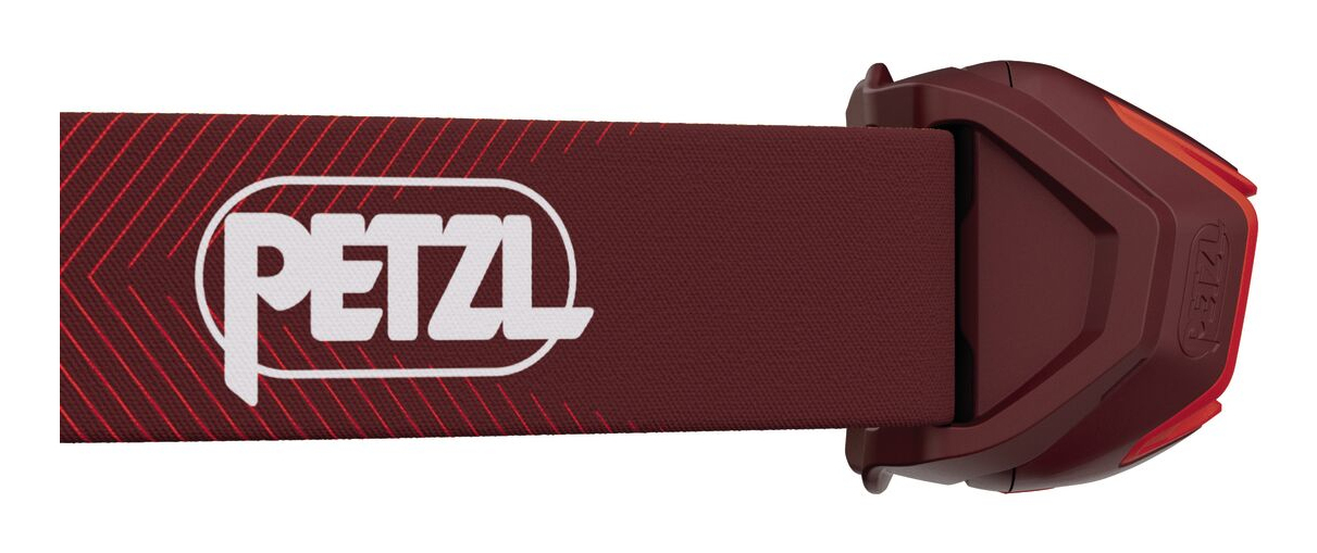 Dunkelrotes Stirnband mit PETZL-Logo und einem roten Gehäuse.