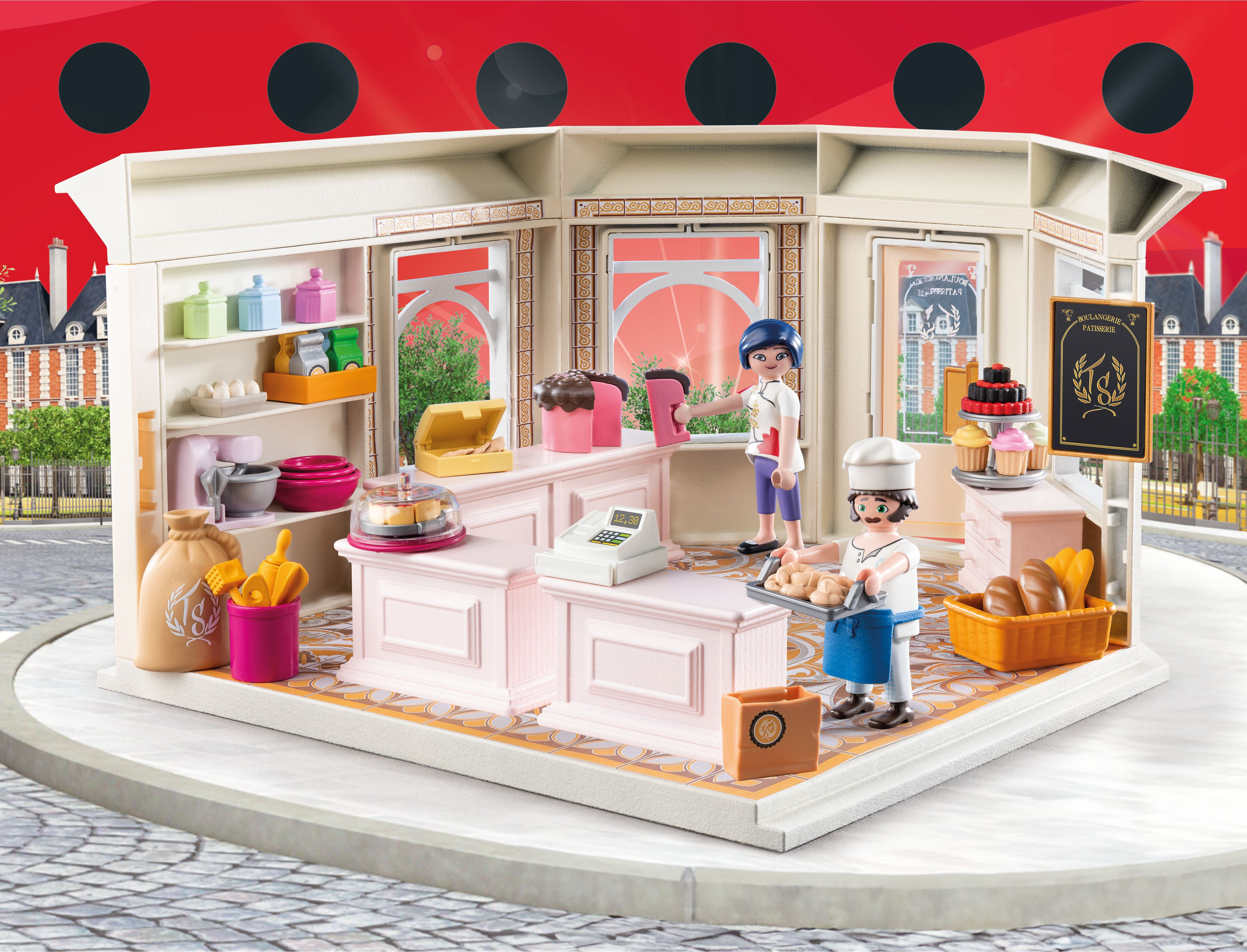 Een bakkerij speelset met twee figuren, taarten, brood en bakgerei.