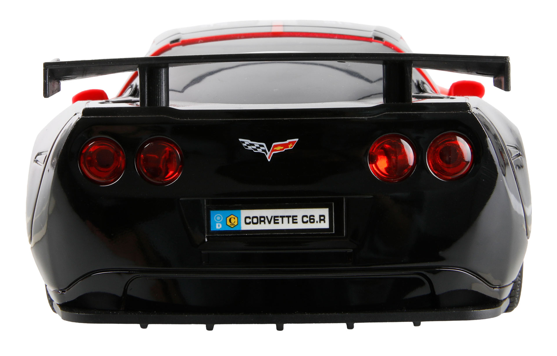 Coche modelo negro con alerón, luces traseras rojas y matrícula 'CORVETTE C6.R'.
