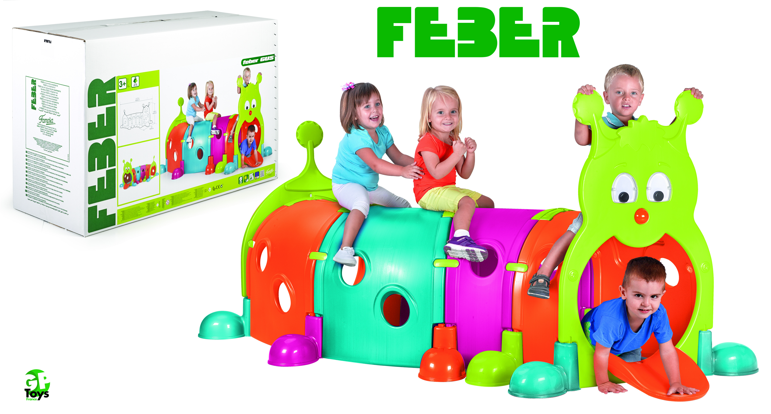 Niños juegan en una colorida estructura de oruga con tobogán.