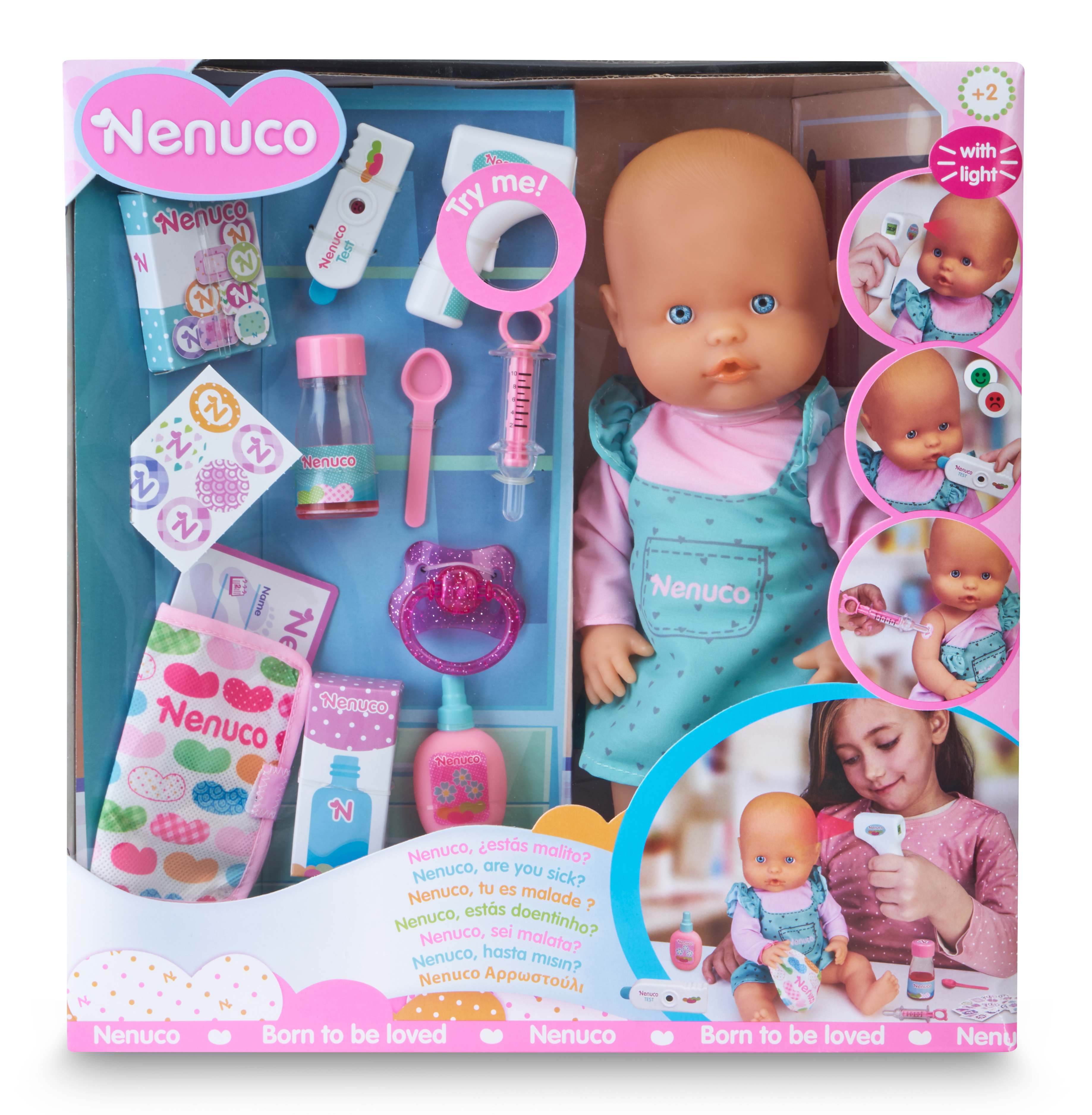 Muñeca bebé Nenuco con accesorios médicos en caja, incluyendo termómetro y jeringuilla.