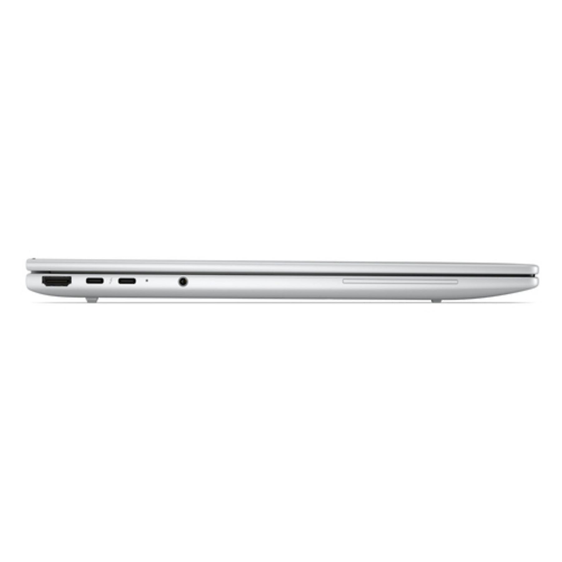 Laptop argentato di profilo, con porte sul bordo sinistro.