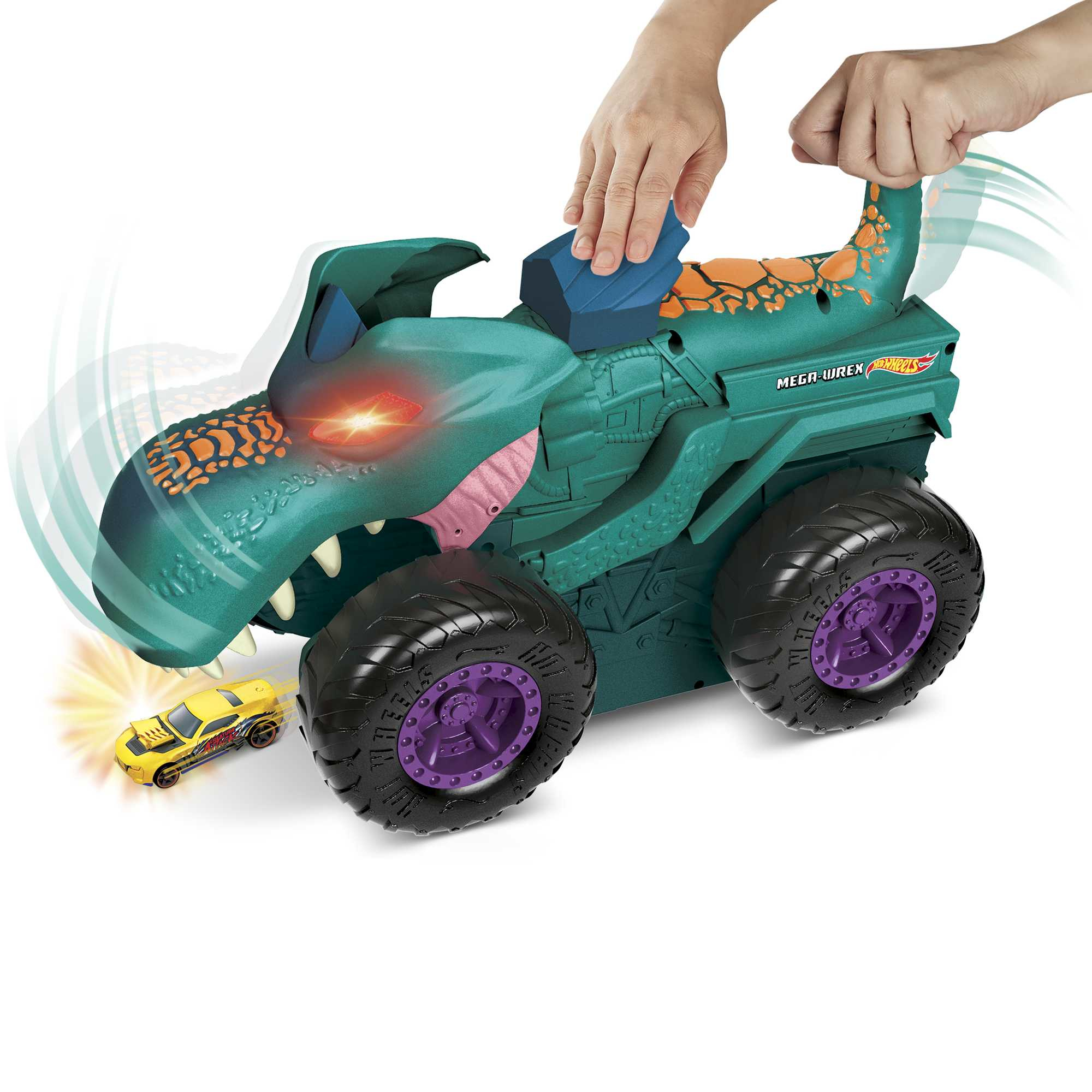 Ein grüner Dino-Monster-Truck mit lila Felgen schnappt nach einem gelben Auto.
