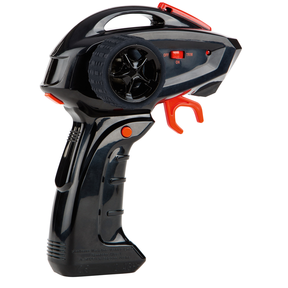 Controlador RC negro con agarre, rueda y botones rojos, sobre fondo blanco.