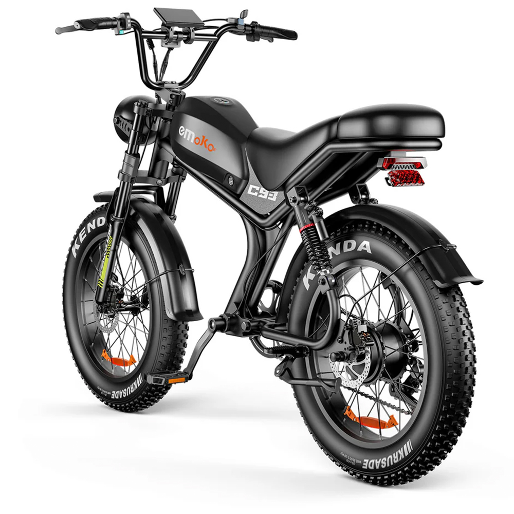 Una bicicleta eléctrica Emoko CS2 negra con neumáticos anchos y pantalla digital.