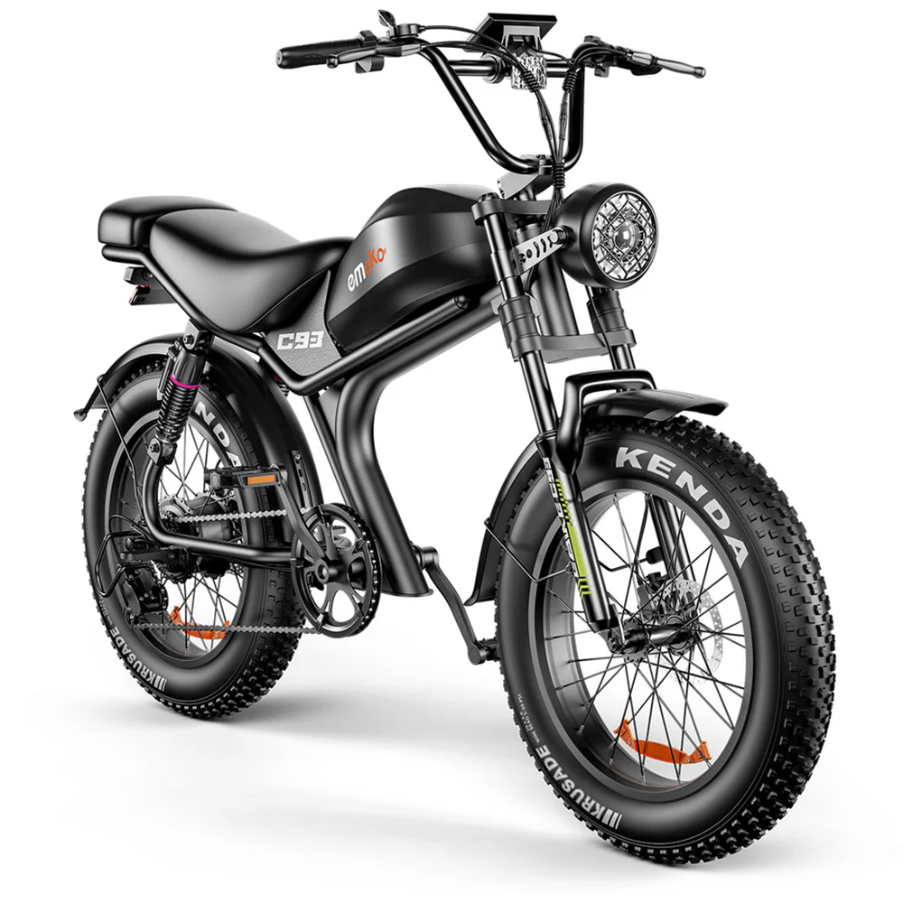 Se muestra una bicicleta eléctrica negra con neumáticos gruesos y faro redondo.