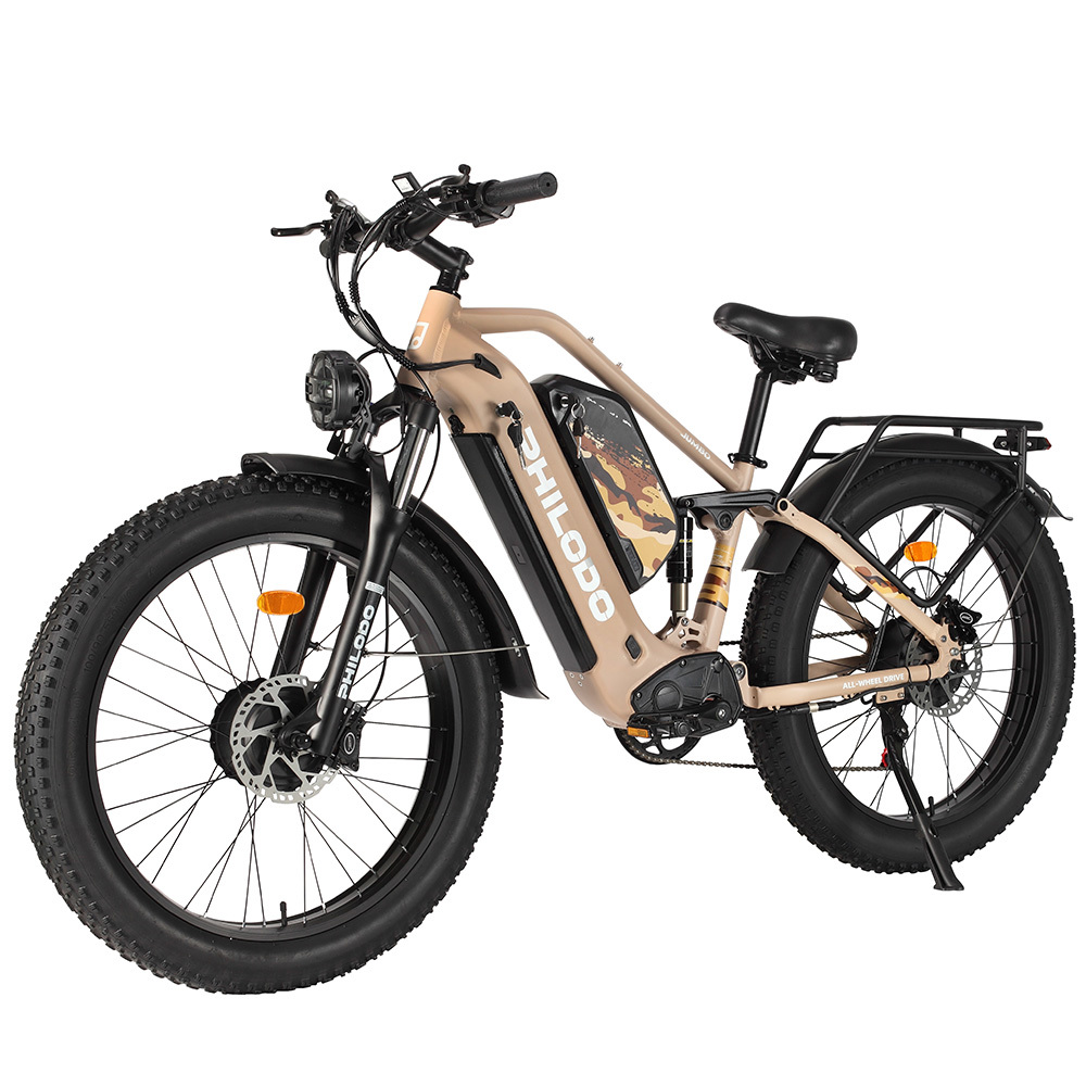 Ein sandfarbenes E-Bike mit breiten Reifen, Federung und Gepäckträger.