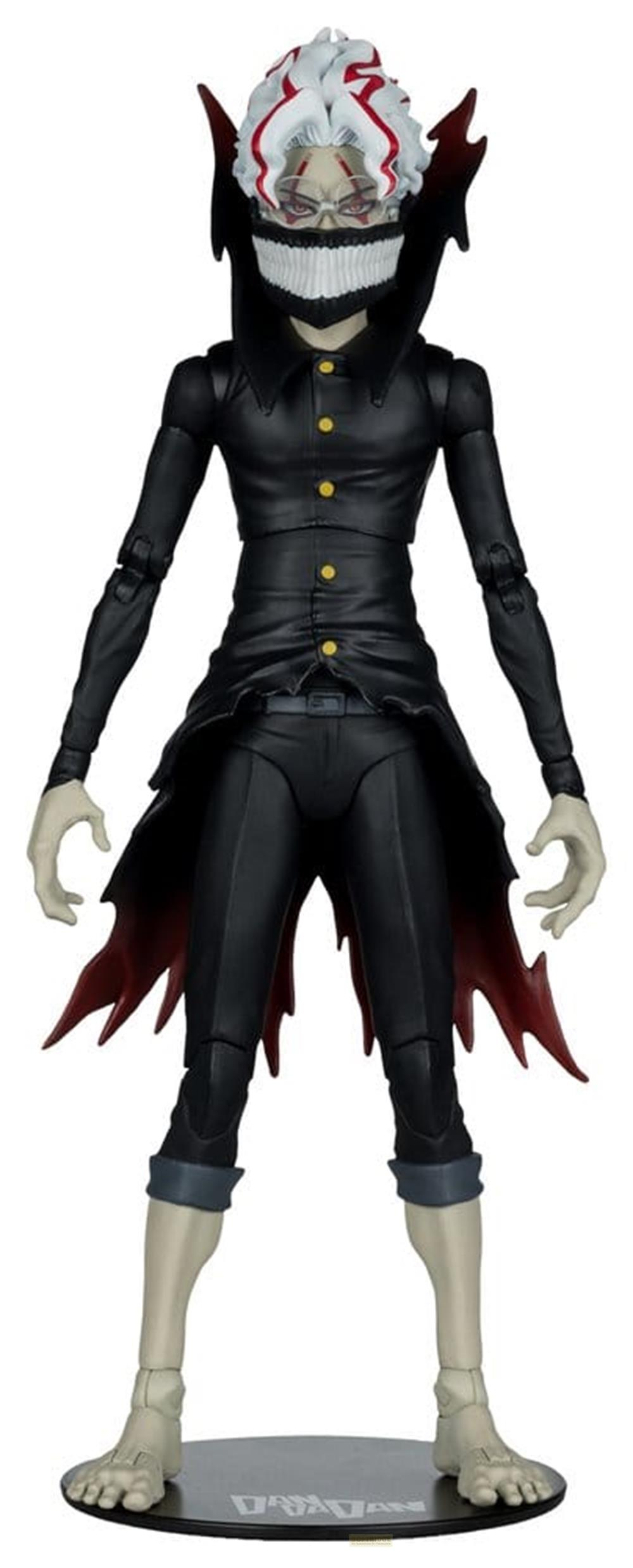 Eine Actionfigur mit weißem Haar, rotem Mundschutz und schwarzer Kleidung.