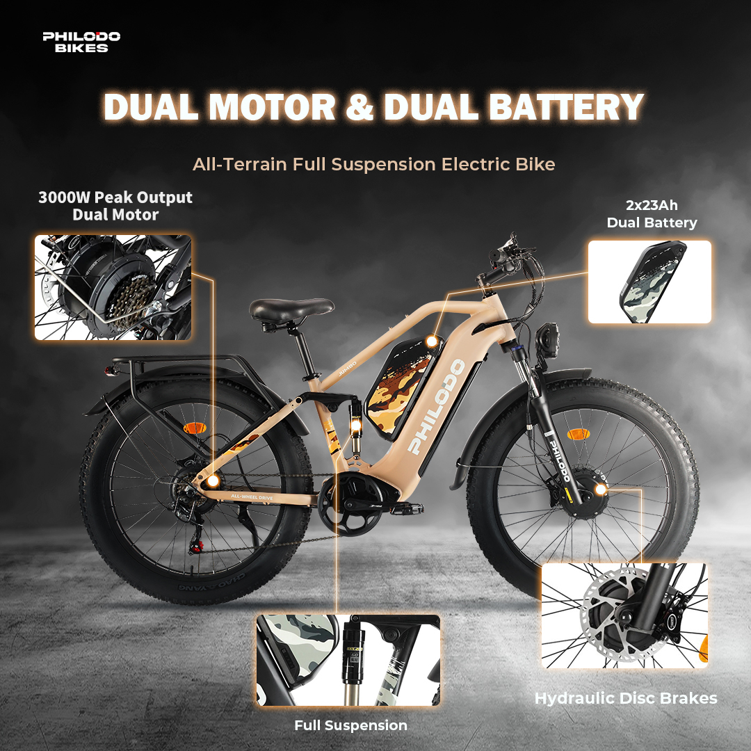 Una bici elettrica Philodo beige con doppio motore, doppia batteria, sospensione completa e freni a disco idraulici.