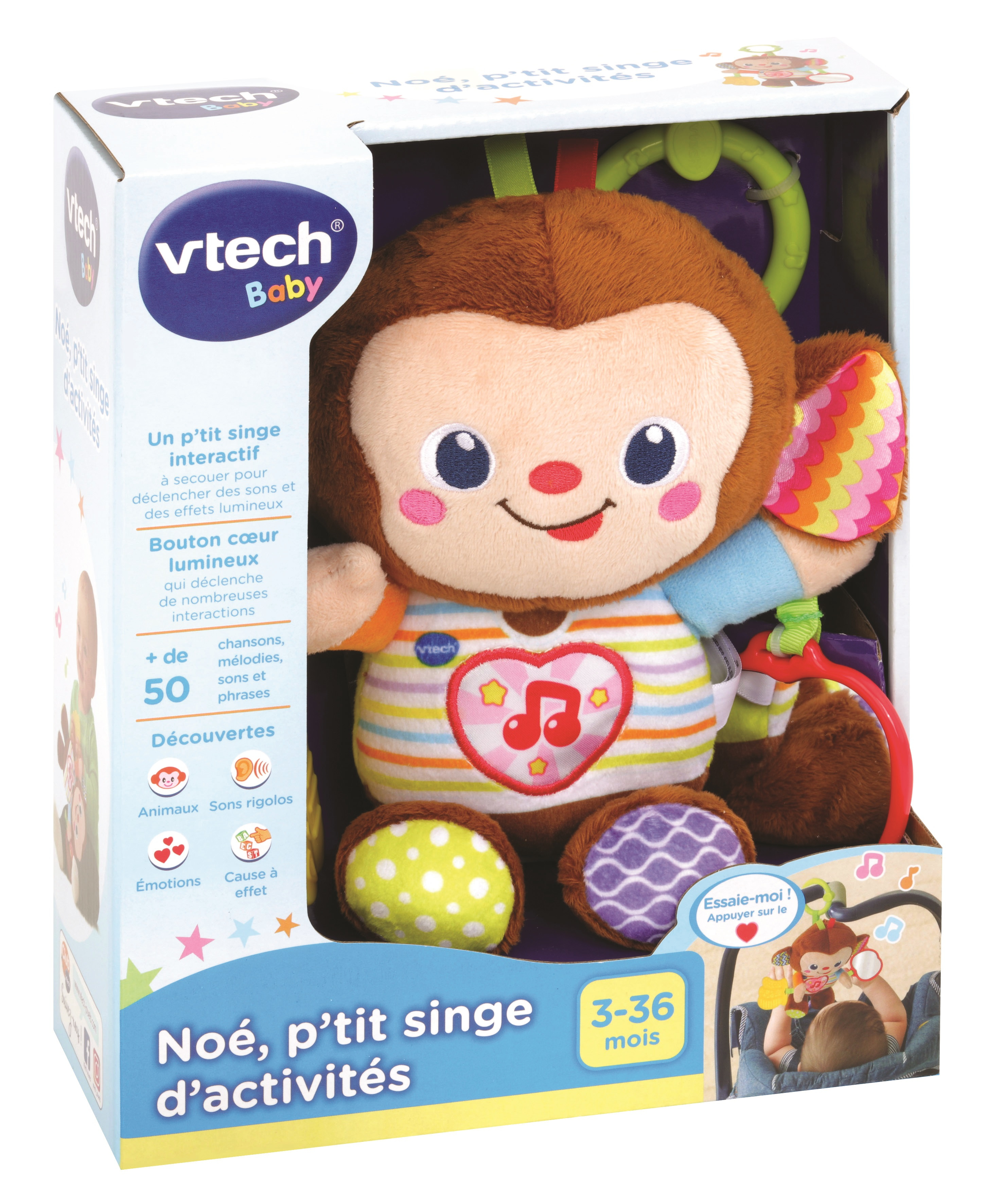 Ein Vtech Baby Plüschaffen-Spielzeug in seiner Verpackung, mit bunten Streifen und herzförmigem Licht.