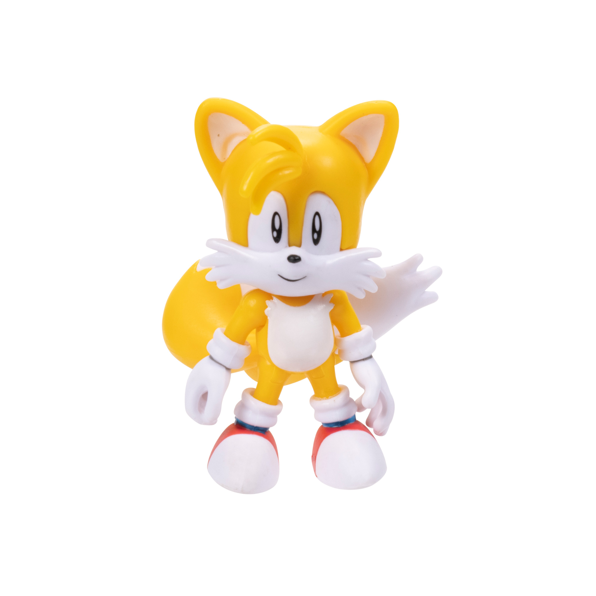 Una figura amarilla con dos colas, guantes blancos y zapatos rojos.