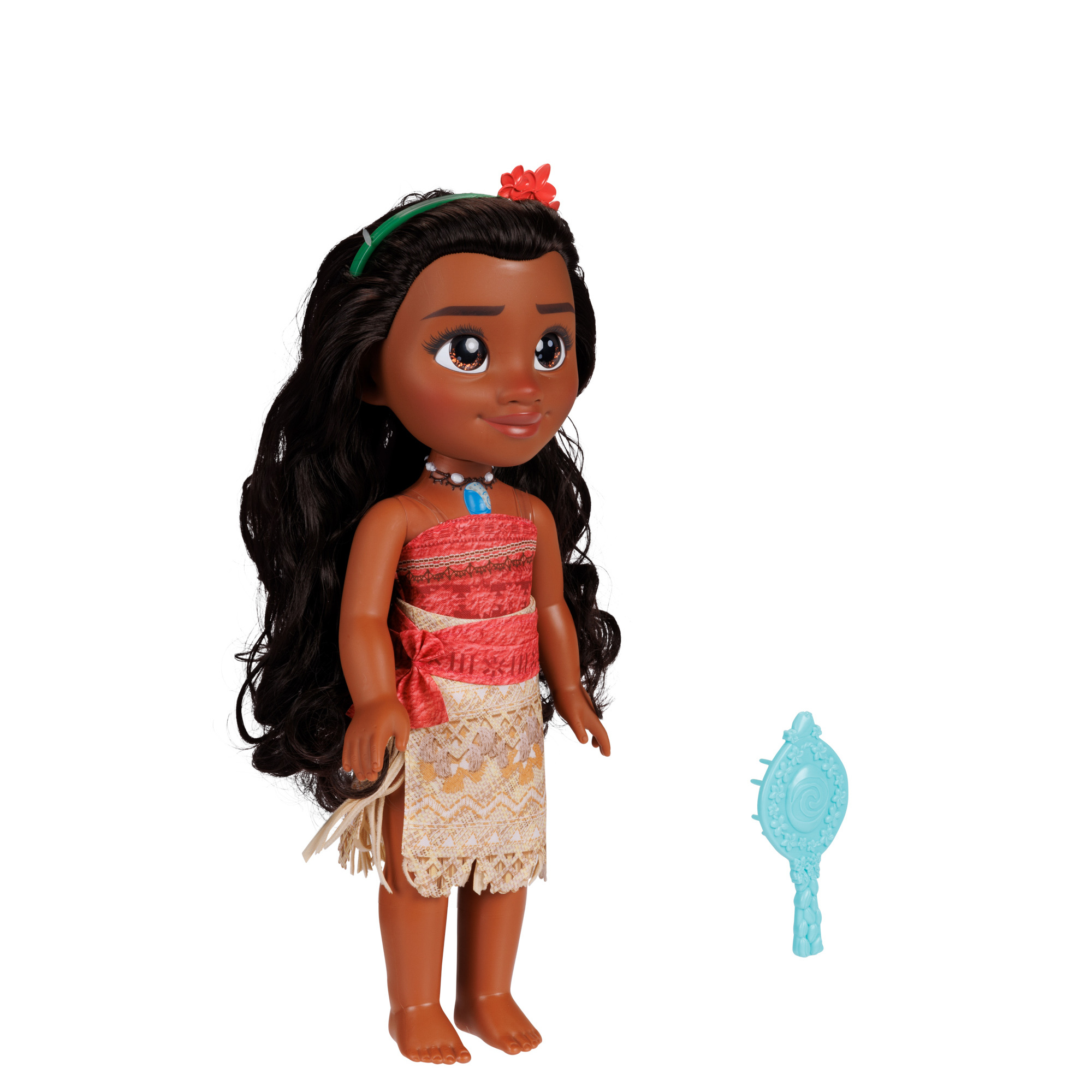 Eine Moana-Puppe mit langen schwarzen Haaren, einem roten Oberteil und einem gemusterten Rock, daneben ein blauer Kamm.