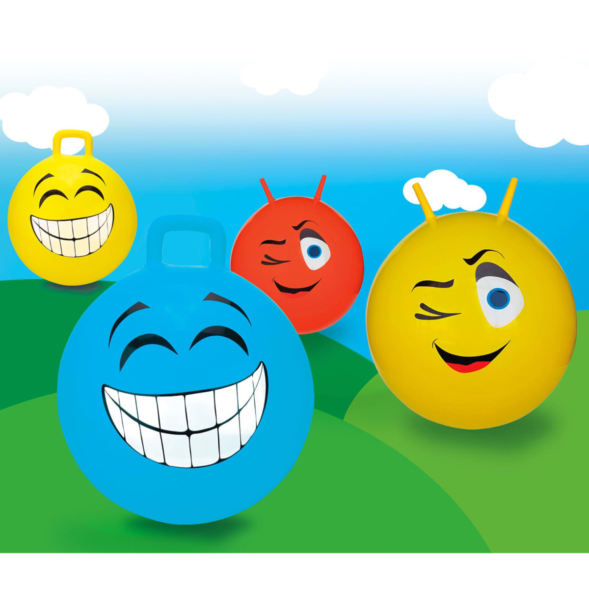 Vier bunte Hüpfbälle mit Emoji-Gesichtern auf grünem Gras unter blauem Himmel mit weißen Wolken.