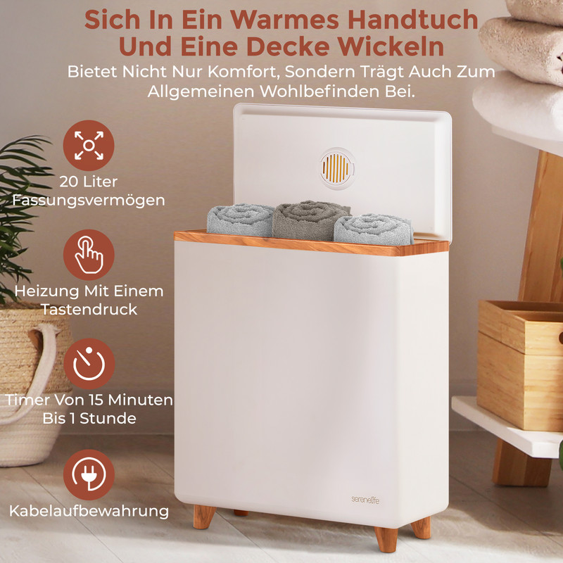 Ein weißer Handtuchwärmer mit Holzdeckel, drei gerollte Handtücher innen.