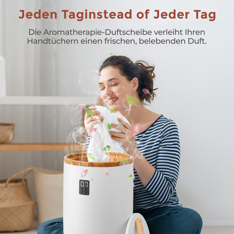 Eine Frau riecht an einem duftenden Handtuch über einem Diffusor.