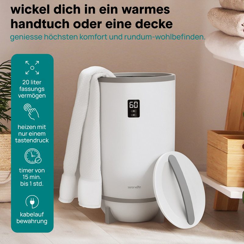 Ein weißer Handtuchwärmer mit einem Handtuch, Display zeigt 60 Min.
