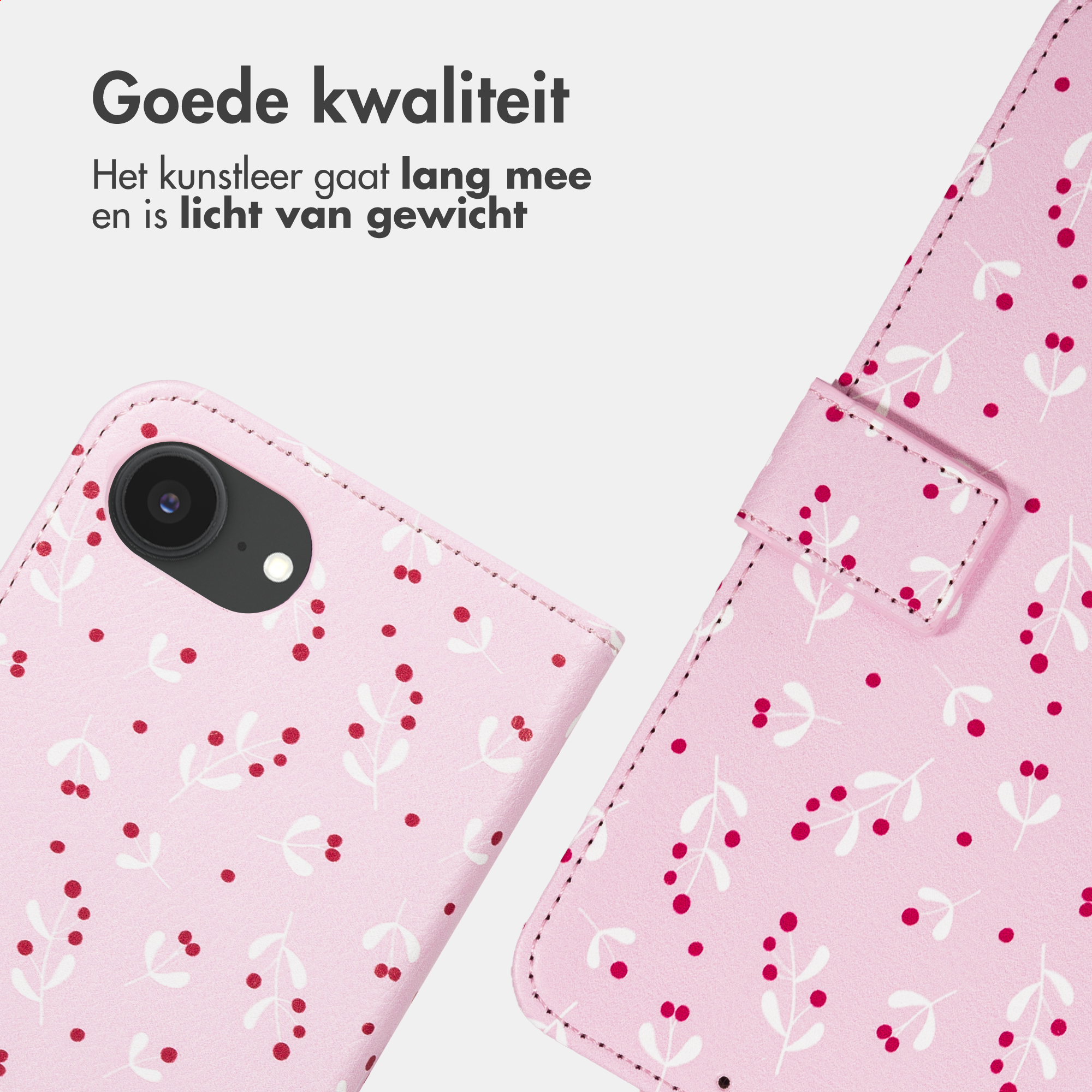 A pink phone case with a white and red berry pattern, showing the camera cutout and a magnetic closure flap.