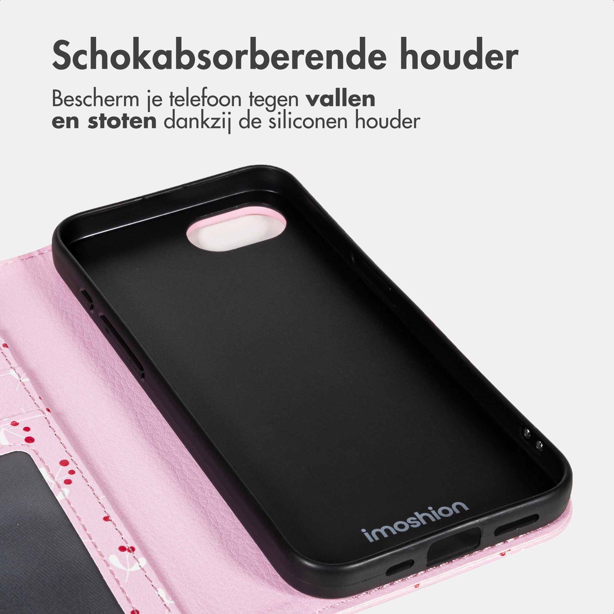 Close-up of a black phone case with a pink pattern and camera cutout.
