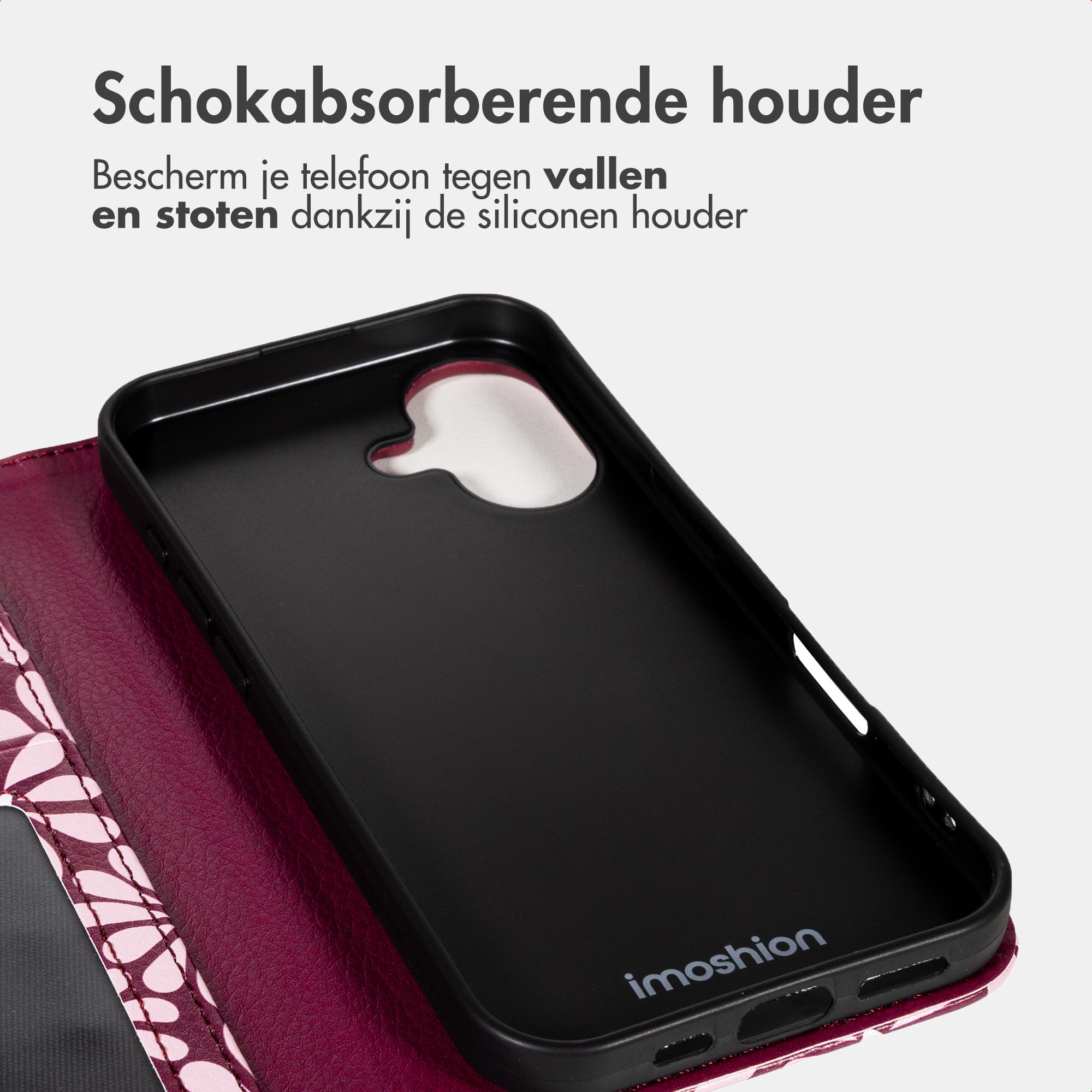 Custodia nera in silicone per telefono con motivo floreale all'interno.