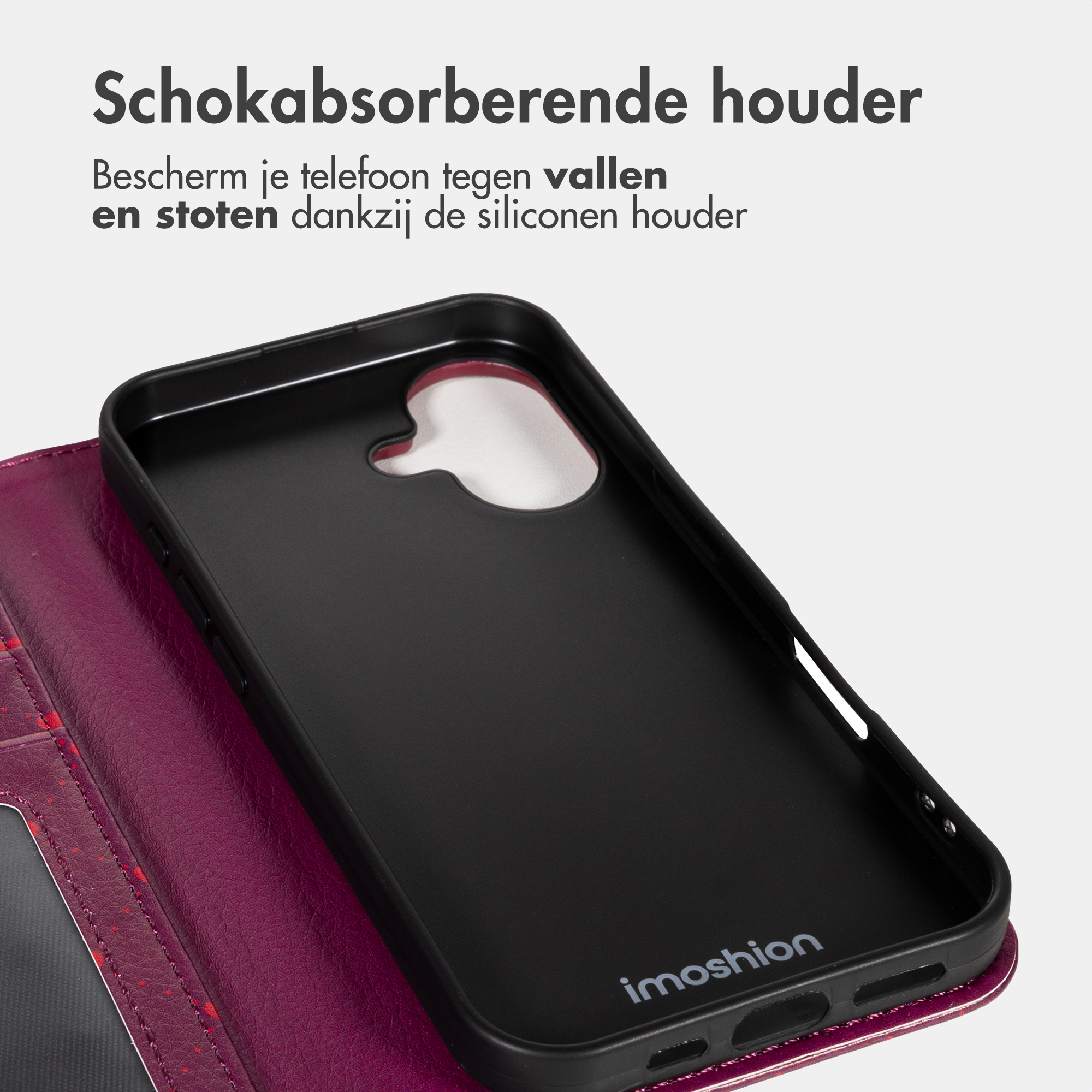 Cover nera per telefono con macchie rosse su cover bordeaux.