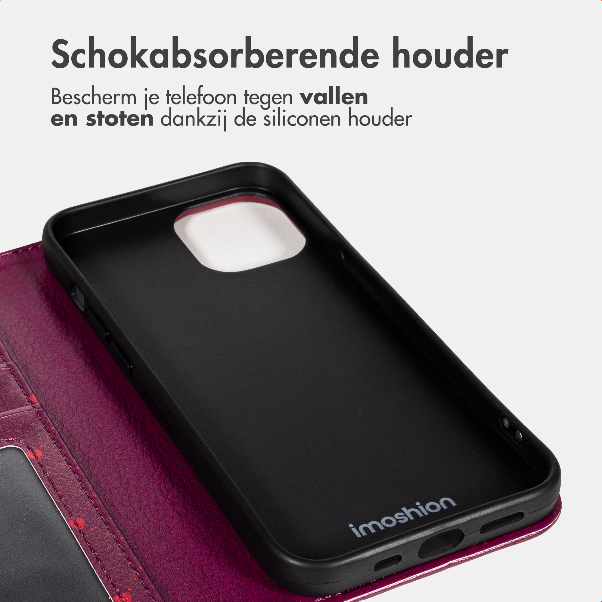 Schwarze Handyhülle mit rotem Ledercover und Herzmuster.