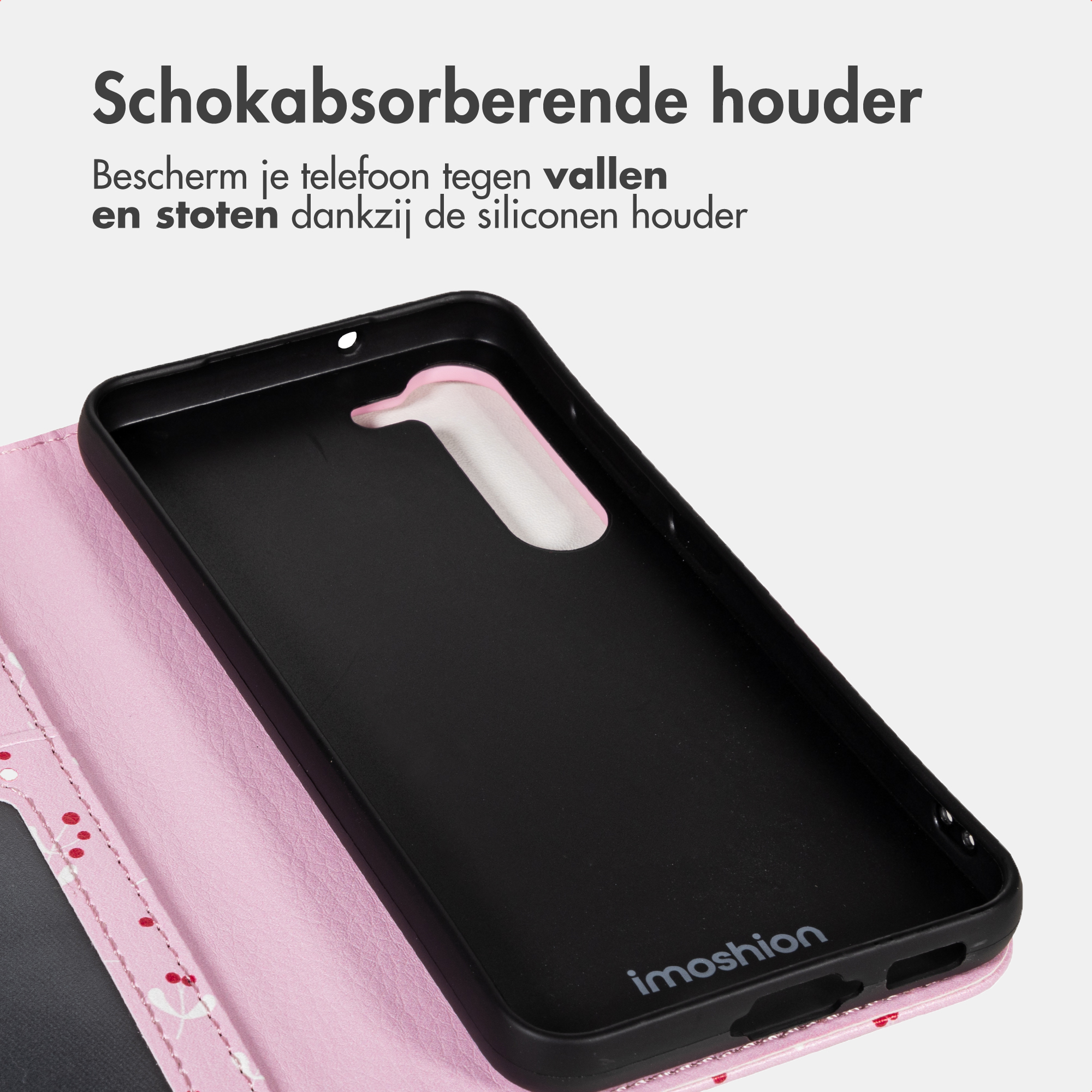 Custodia in silicone nera con interno rosa e motivo a ciliegia.