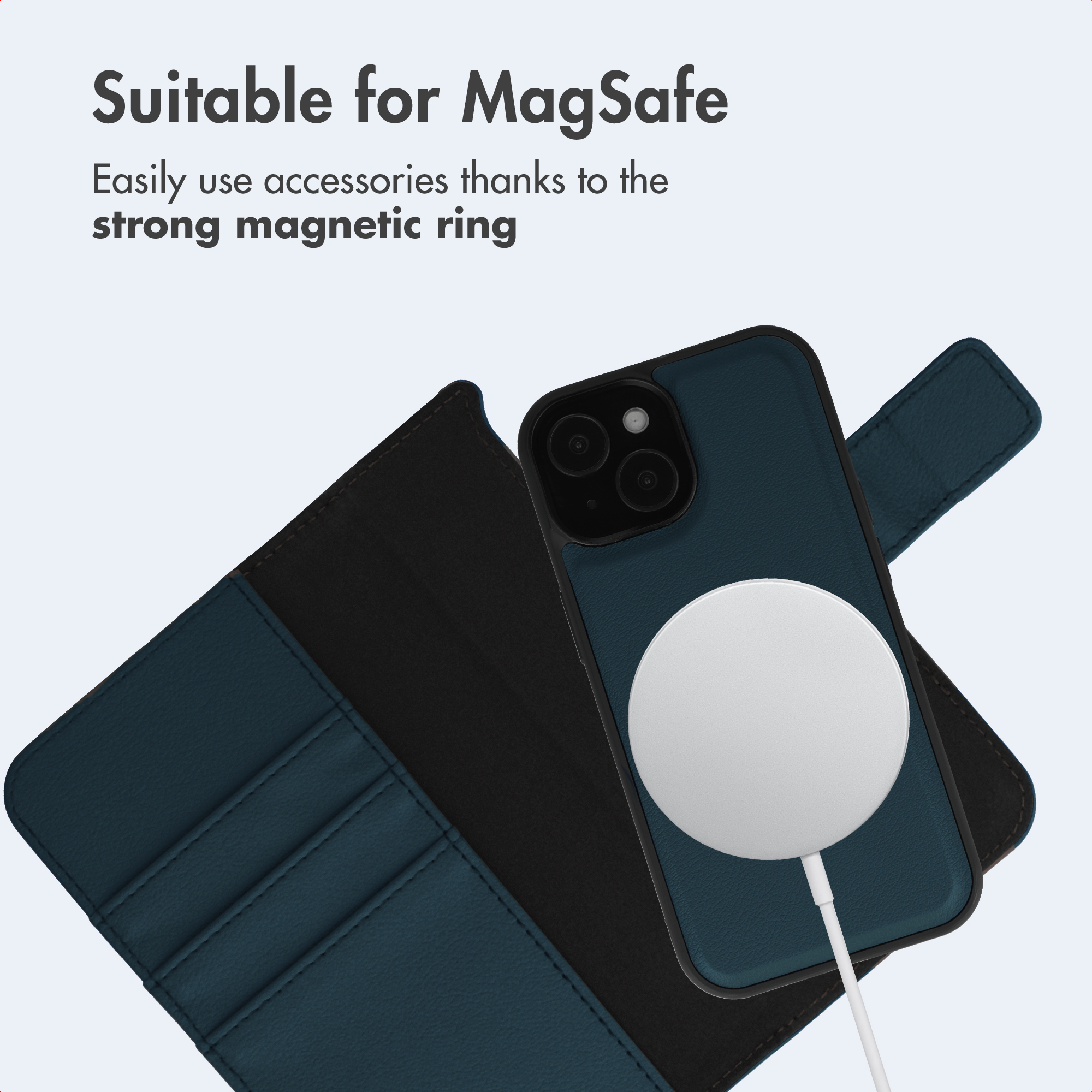 A dark blue phone case with a black border has a white circular MagSafe charger attached to its back. The case is open, revealing slots.