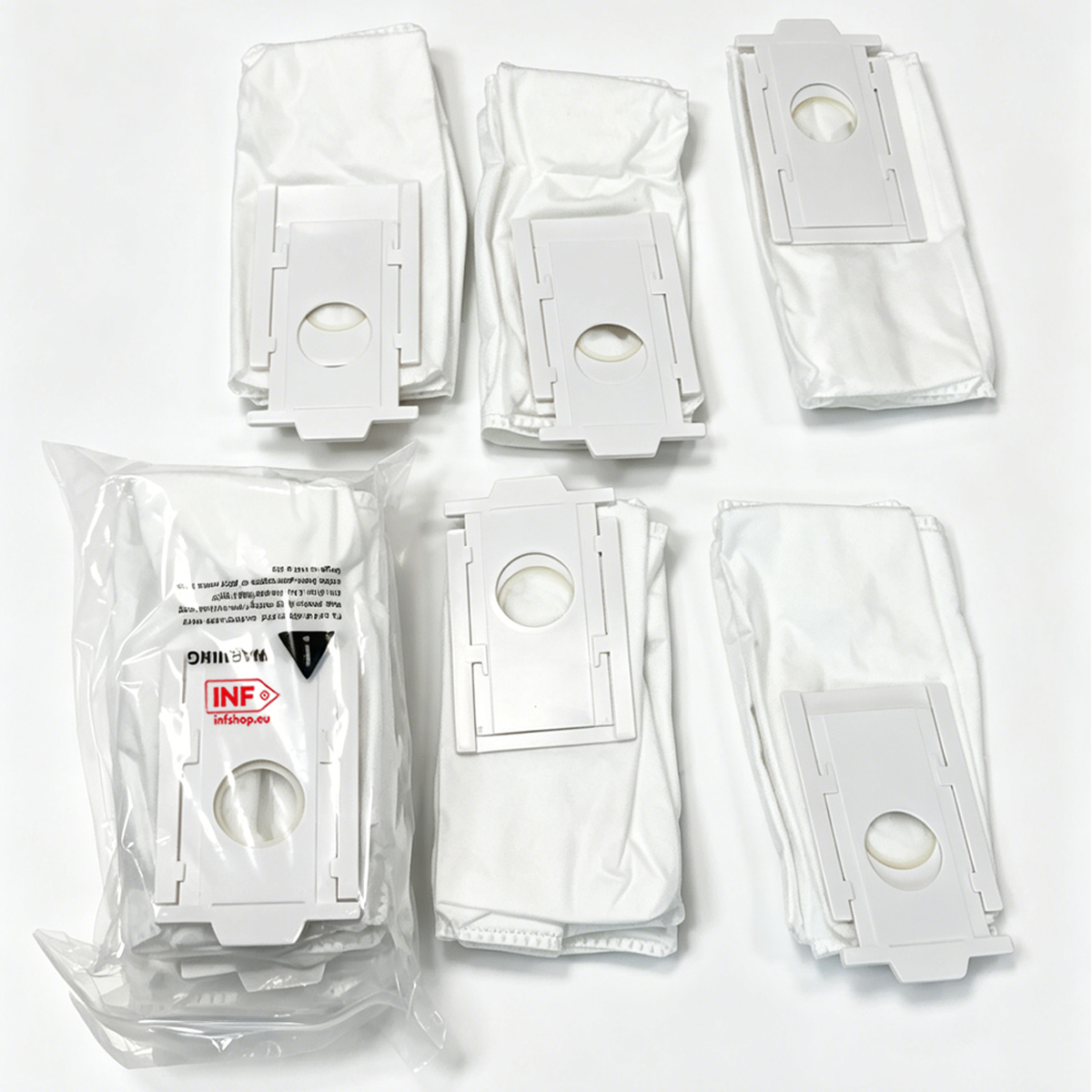 Six white vacuum cleaner bags with white connectors on a white background.