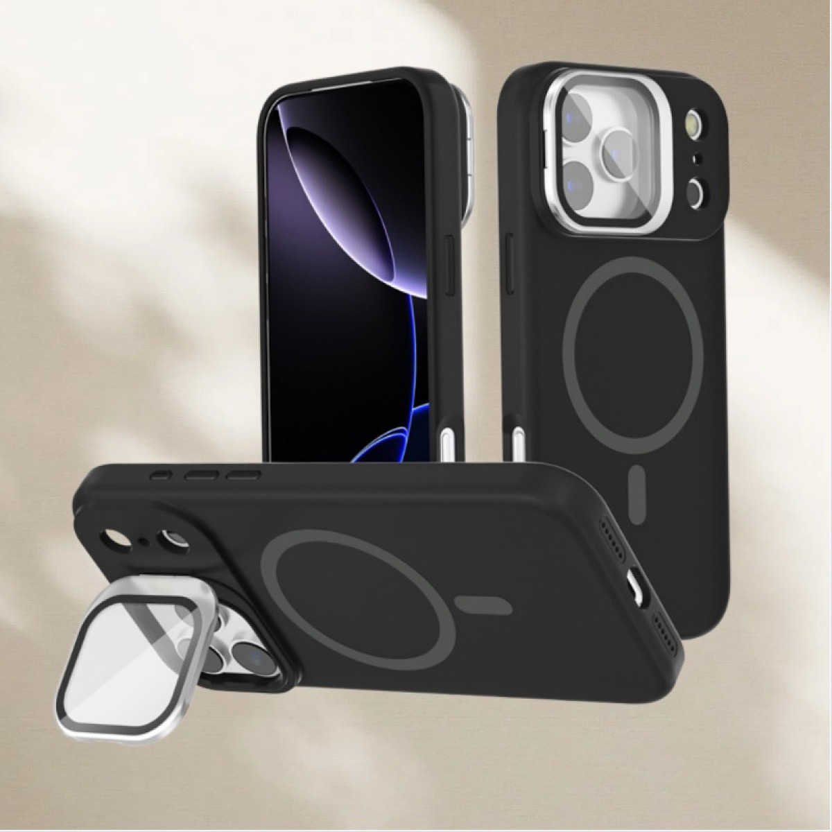 Tre custodie nere per telefono con anelli magnetici sono esposte su una superficie marrone chiaro.