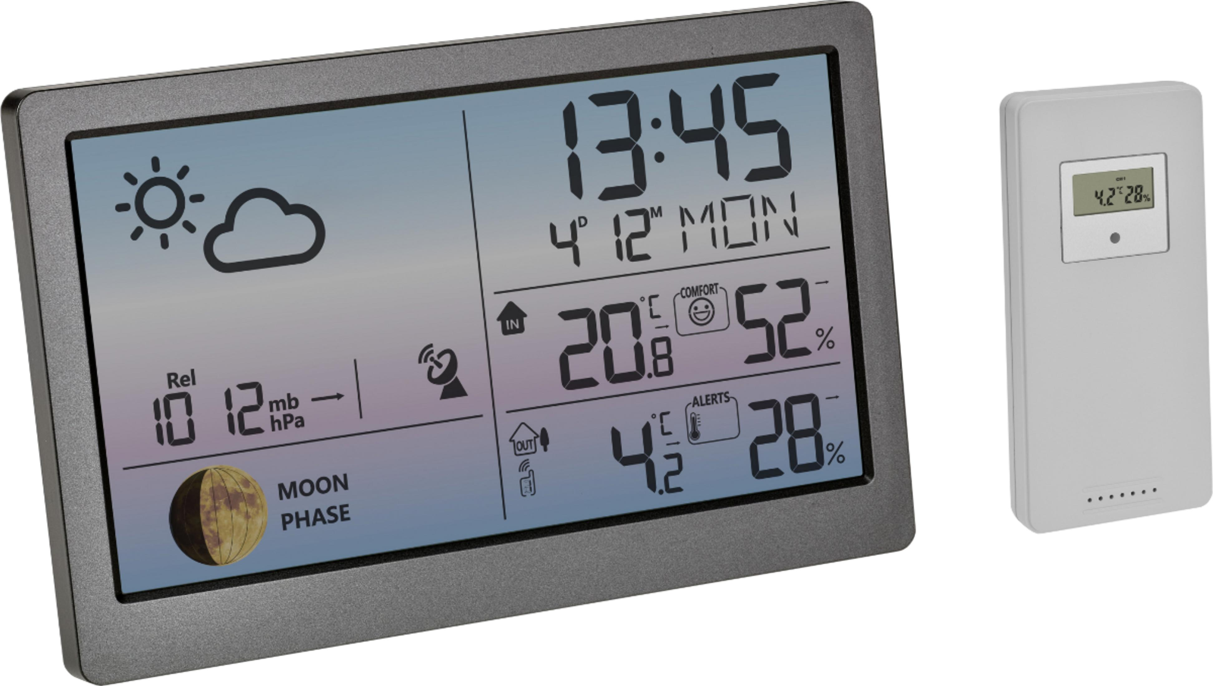 Digitale Wetterstation mit Innen- und Außensensoren zeigt Uhrzeit, Datum, Temperatur und Luftfeuchtigkeit an.