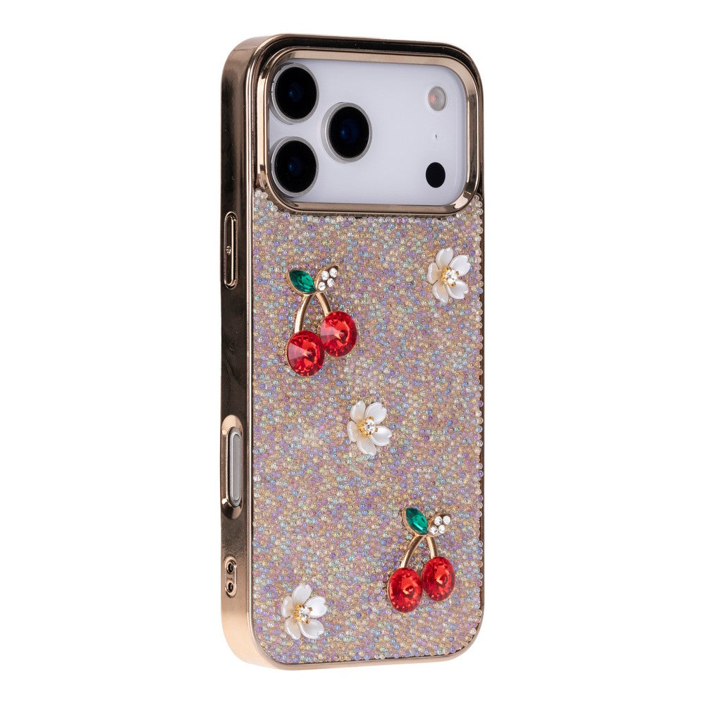 Simli ve kirazlı altın rengi telefon kılıfı.