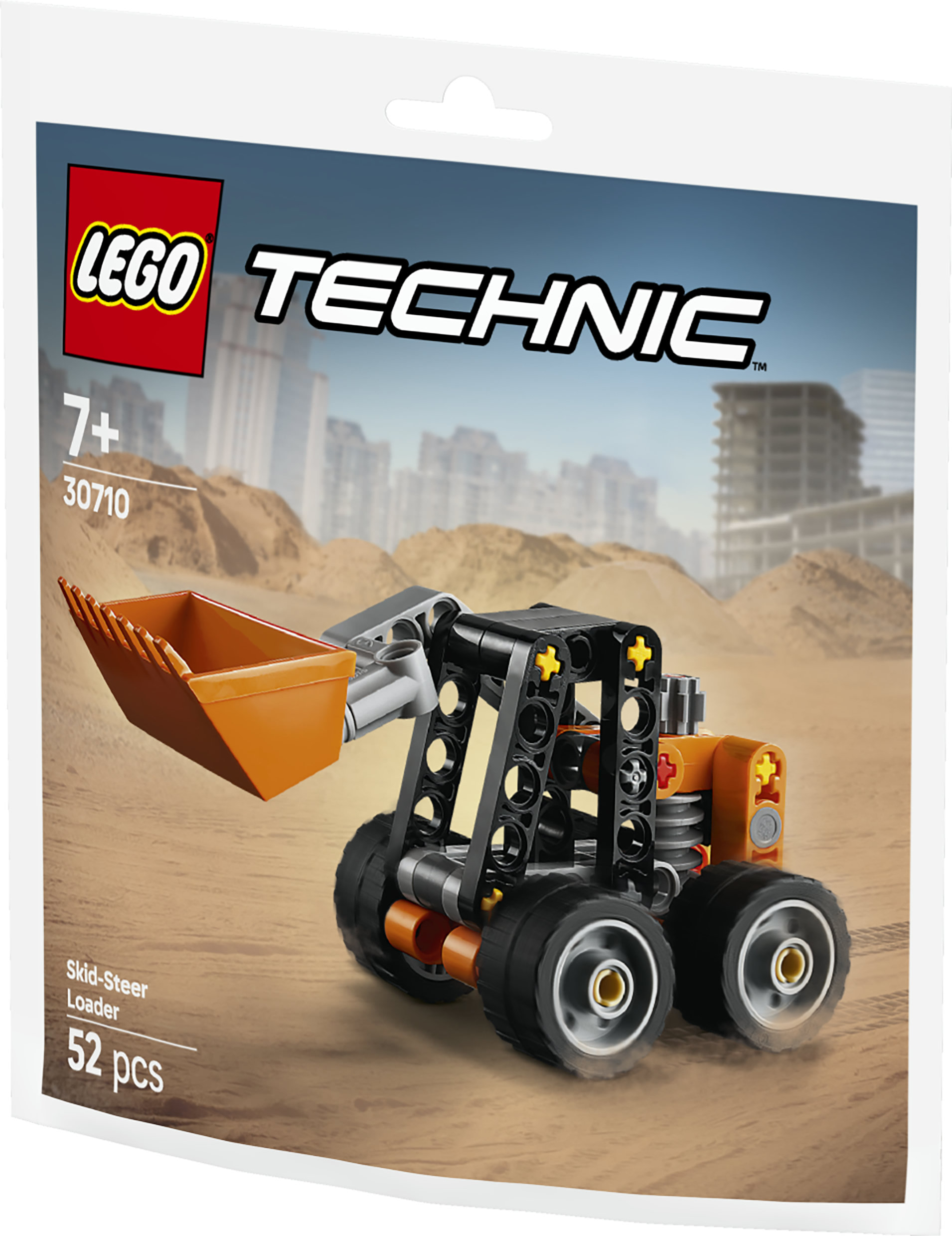 Turuncu kovaya sahip bir Lego Technic kayar direksiyonlu yükleyici yapımı.