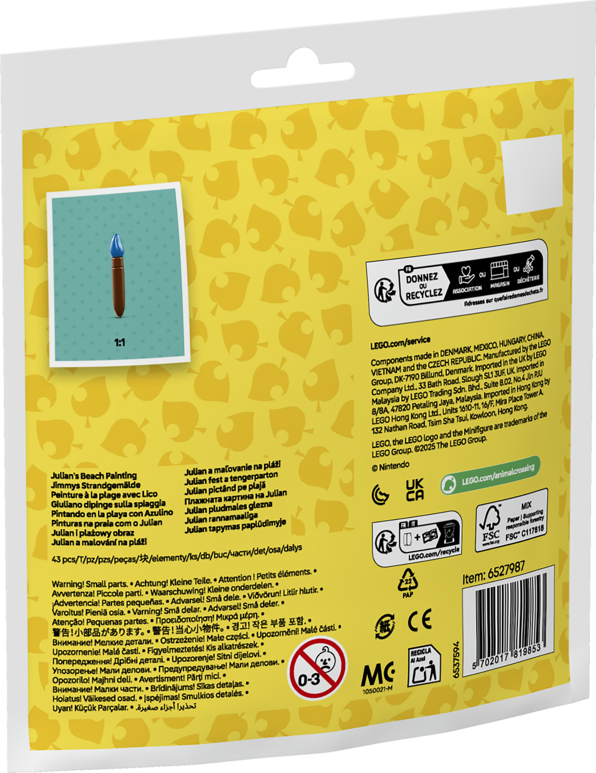 Un sac en plastique transparent contenant un ensemble LEGO, présentant un pinceau bleu sur un fond sarcelle avec des feuilles jaunes.
