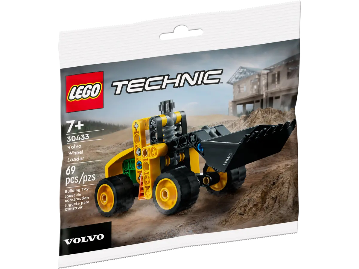 Confezione Lego Technic Pale Volvo, gialla e nera, con cantiere sullo sfondo.