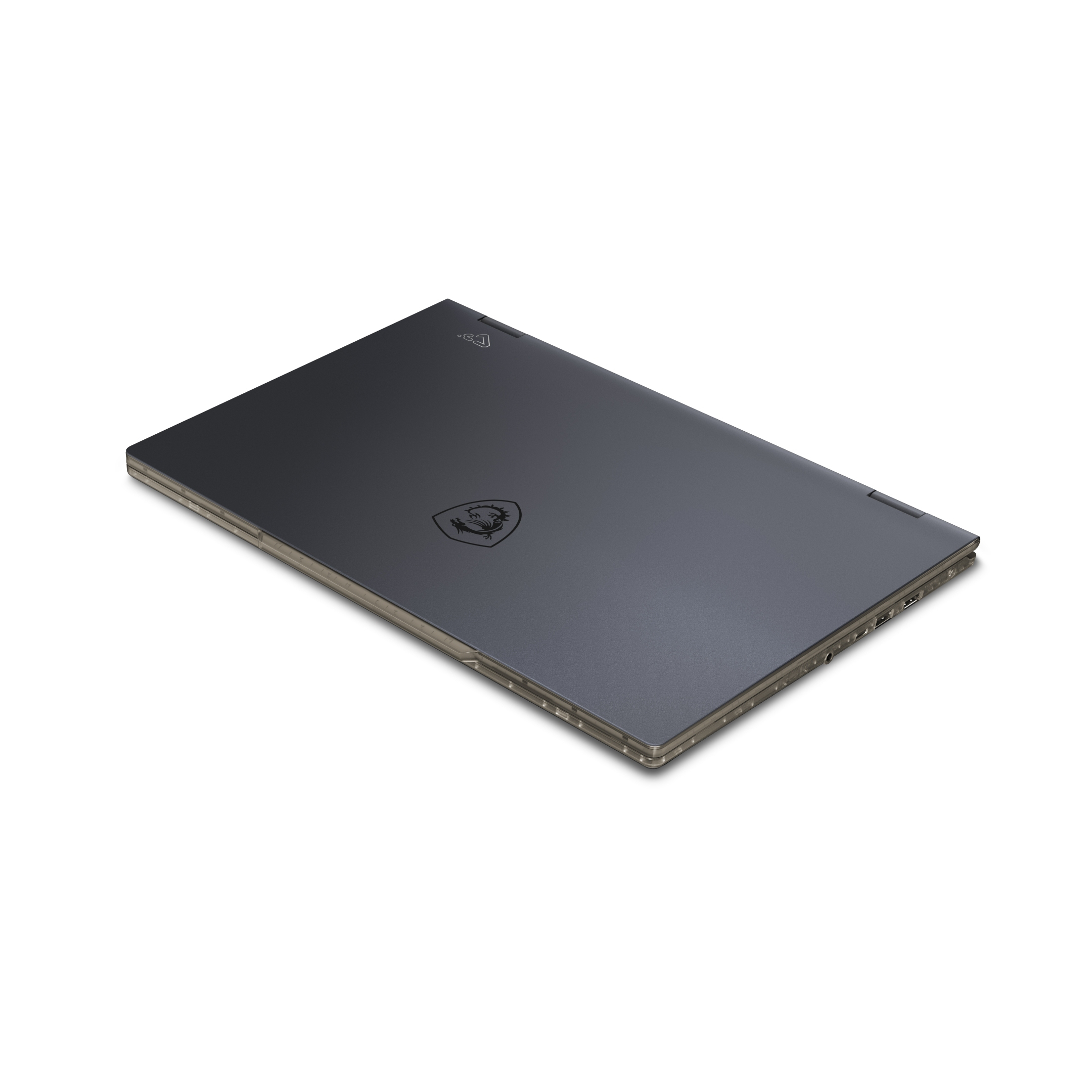 Laptop grigio scuro chiuso con logo MSI sul coperchio.