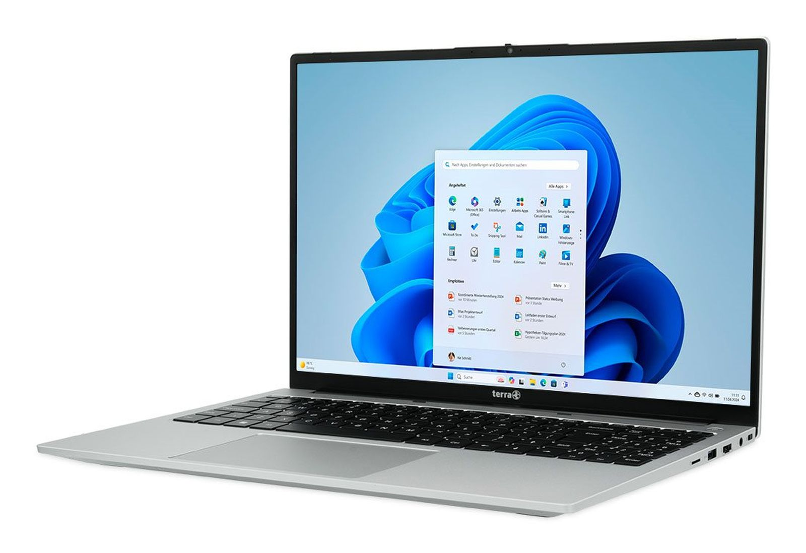 Ein silberner Laptop mit geöffnetem Windows 11 Startmenü, das Apps und Empfehlungen anzeigt.
