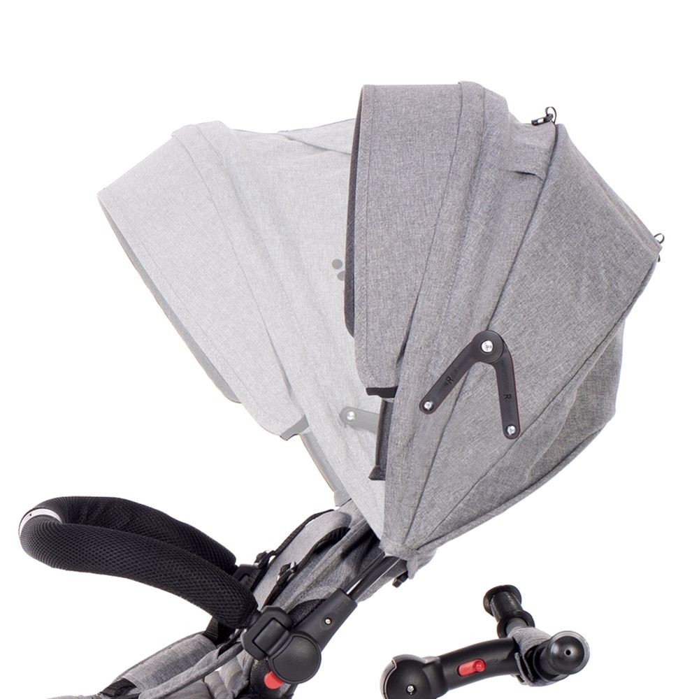 Grauer Kinderwagen-Sonnenschutz mit schwarzem Griff und Lenker.