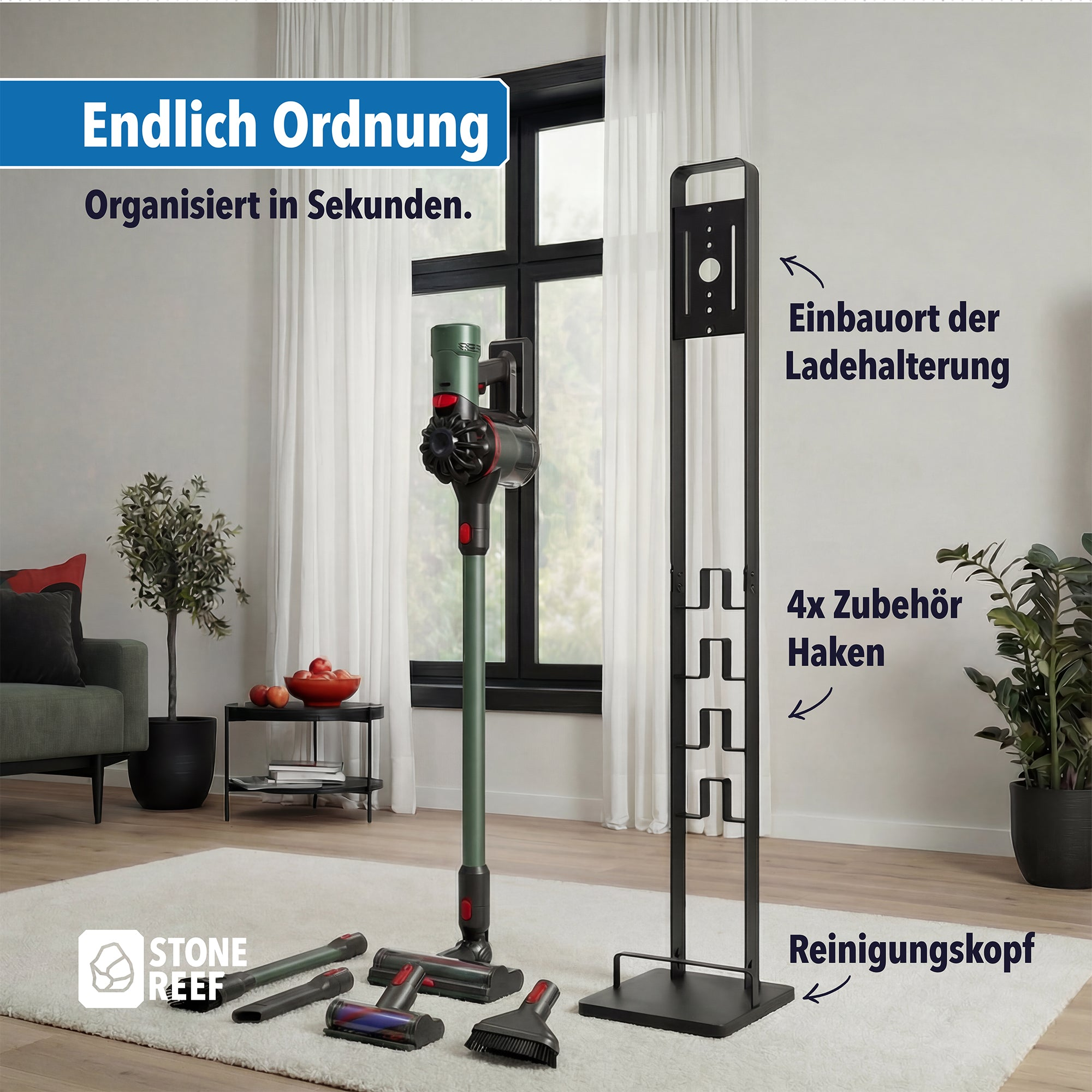 Ein grüner Handstaubsauger steht neben einem Ständer mit Zubehörhaken.