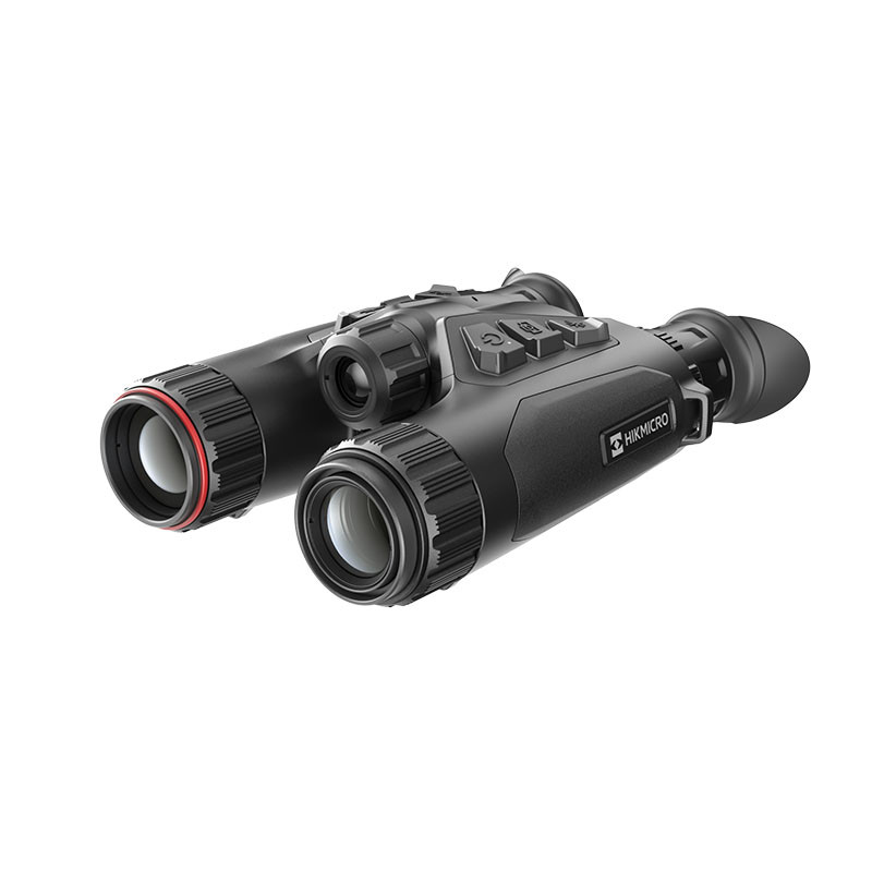 Binoculares de visión nocturna negros con anillos rojos y botones, sobre fondo blanco.