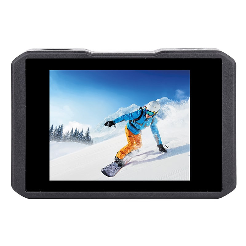 Ein Snowboarder fährt einen schneebedeckten Hang mit blauer Kleidung hinunter.