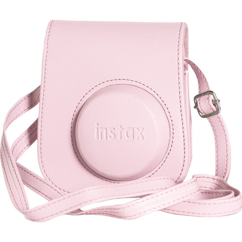 Pembe bir kamera çantası, omuz askısı ve 