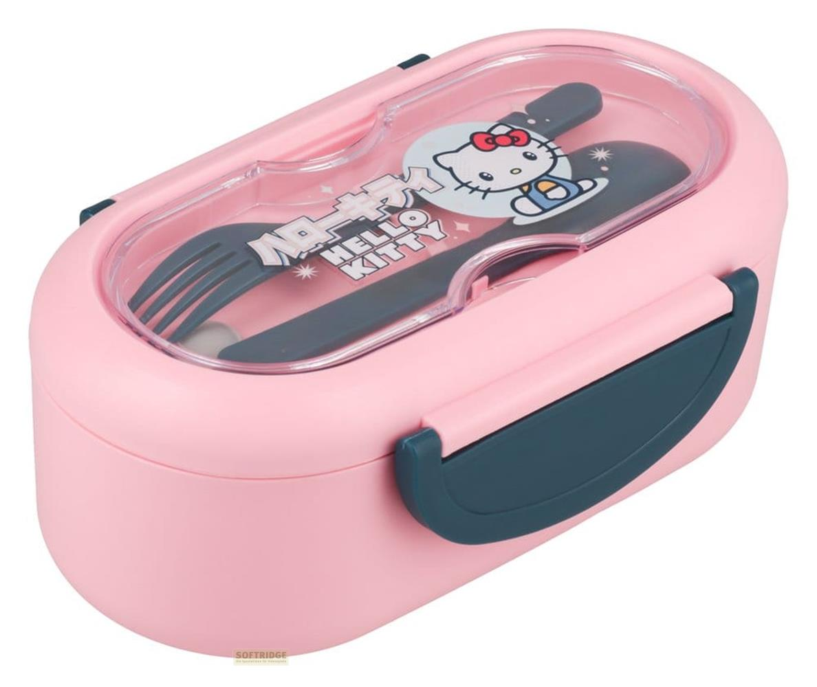 Eine rosafarbene Lunchbox mit Hello Kitty-Motiv und Besteck.