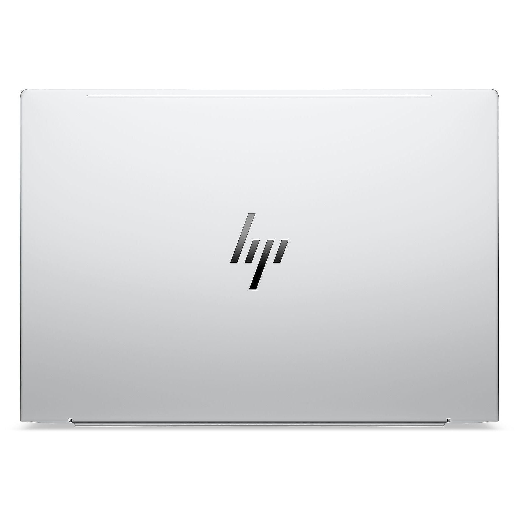 Laptop argentato chiuso con logo HP al centro.
